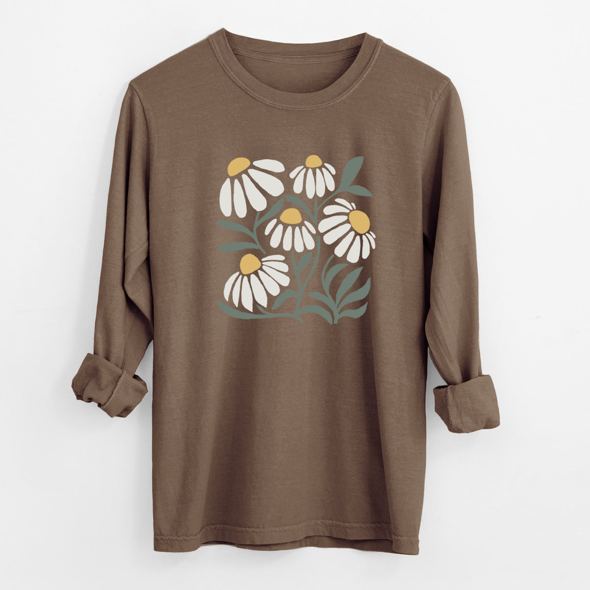Espresso brown Comfort Colors long sleeve shirt laid flat with the cuffs rolled, printed with a soft full-color illustration of white chamomile flowers and green leaves.