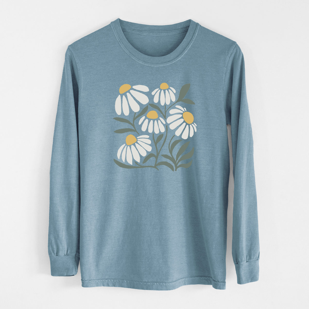 Steel blue Comfort Colors long sleeve shirt laid flat, printed with a soft full-color illustration of white chamomile flowers and green leaves.