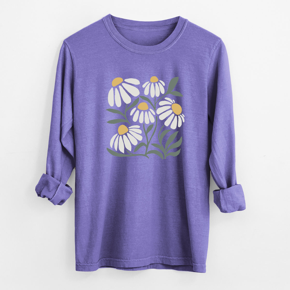 Violet purple Comfort Colors long sleeve shirt laid flat with the cuffs rolled, printed with a soft full-color illustration of white chamomile flowers and green leaves.