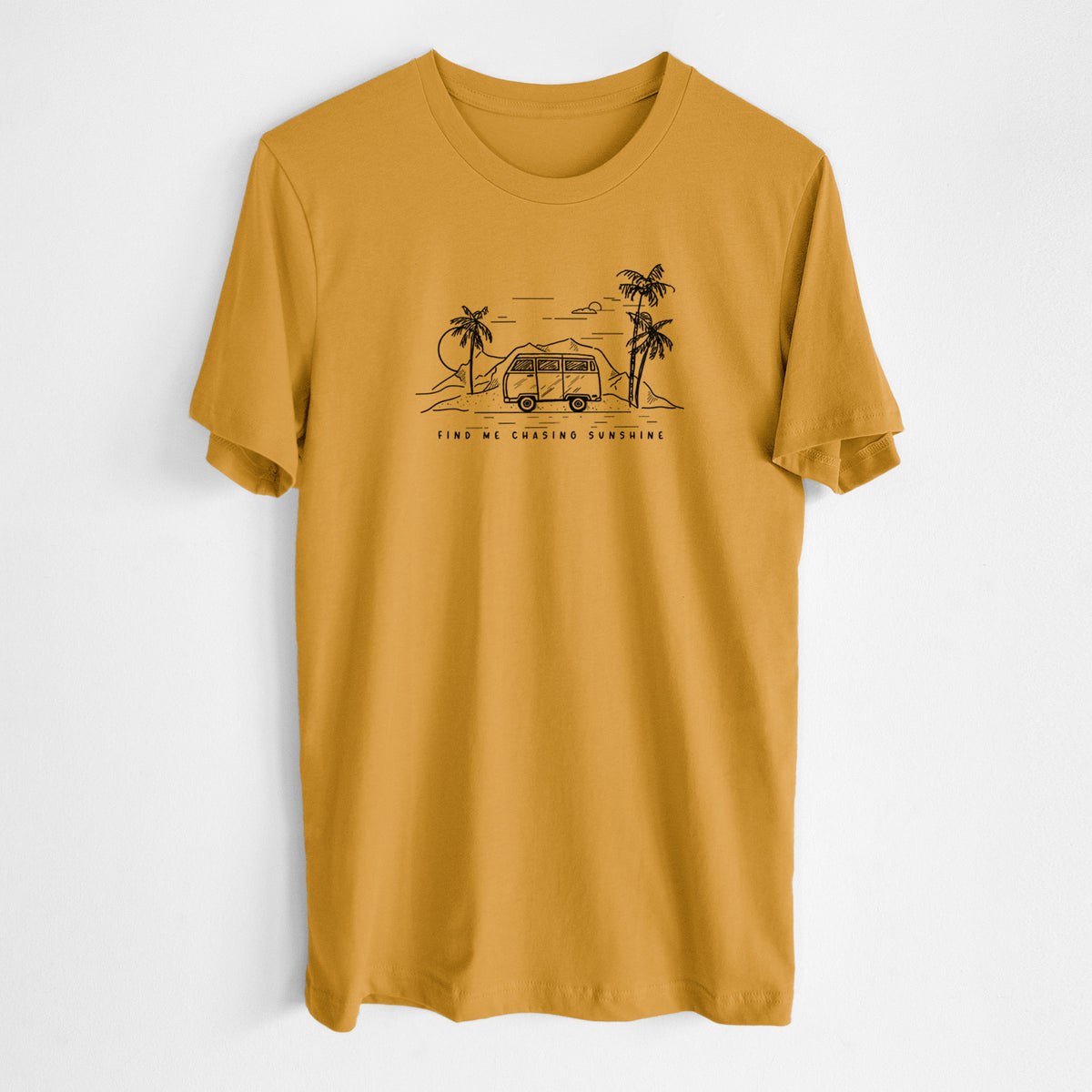 Honeycomb yellow lightweight cotton t-shirt laid flat, printed with a black ink illustration of a camper van under palm trees and the sun, with the words Find Me Chasing Sunshine.