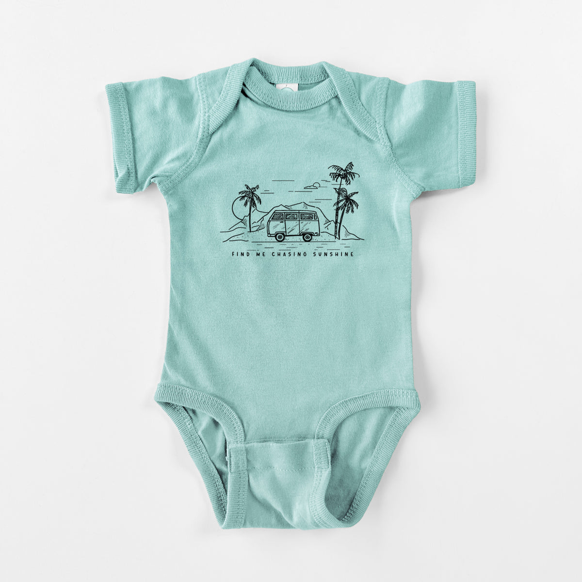 Saltwater baby bodysuit laid flat, printed with a black ink illustration of a camper van under palm trees and the sun, with the words Find Me Chasing Sunshine.