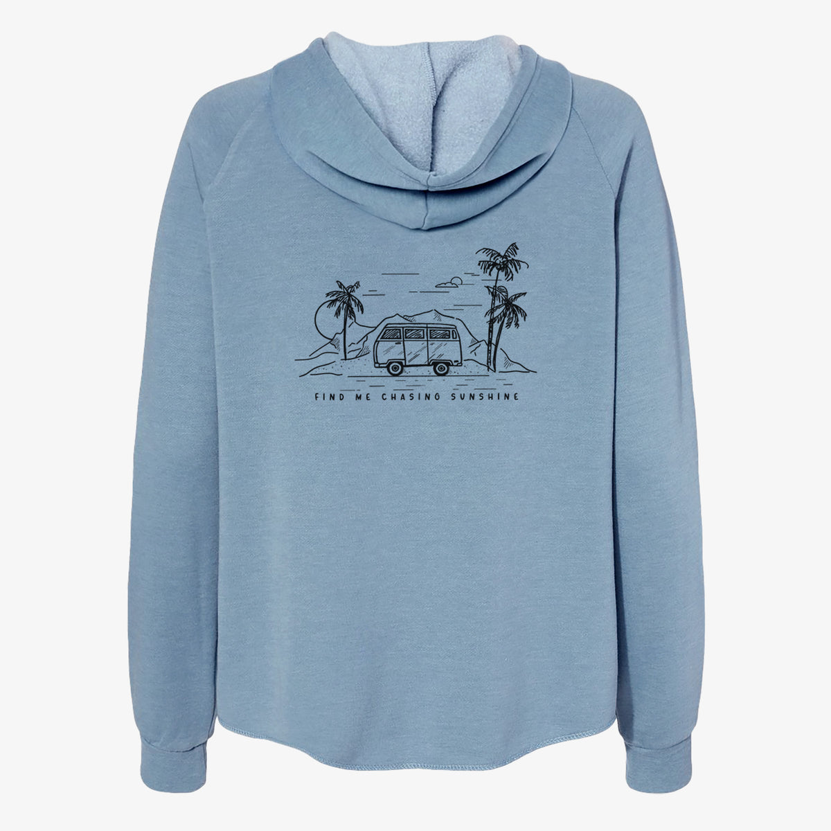 Misty blue women's Cali Wave zip-up sweatshirt laid flat, printed with a black ink illustration of a camper van under palm trees and the sun, with the words Find Me Chasing Sunshine.