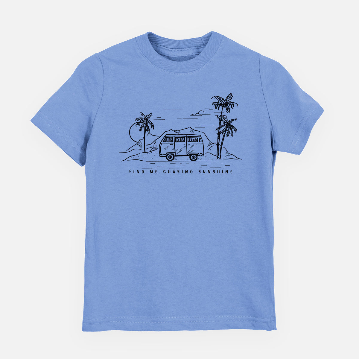 Carolina blue youth t-shirt laid flat, printed with a black ink illustration of a camper van under palm trees and the sun, with the words Find Me Chasing Sunshine.
