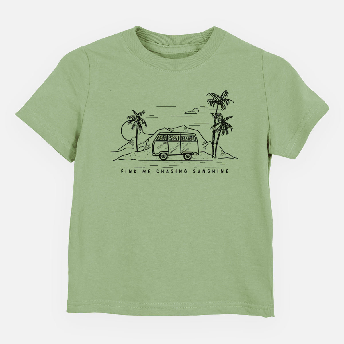 Sage green toddler t-shirt laid flat, printed with a black ink illustration of a camper van under palm trees and the sun, with the words Find Me Chasing Sunshine.