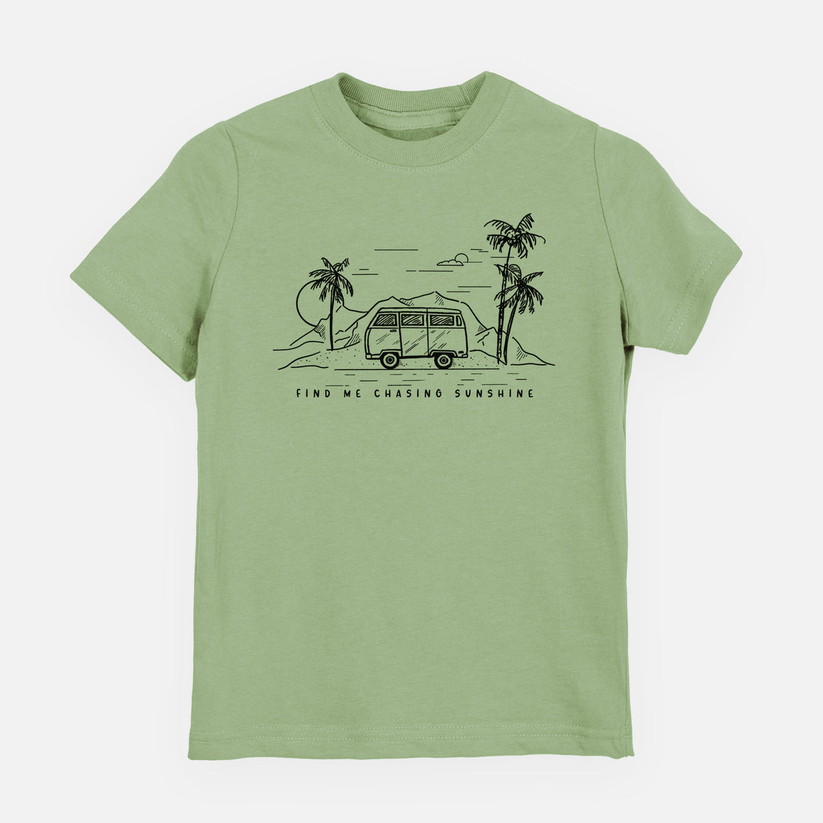 Sage green youth t-shirt laid flat, printed with a black ink illustration of a camper van under palm trees and the sun, with the words Find Me Chasing Sunshine.