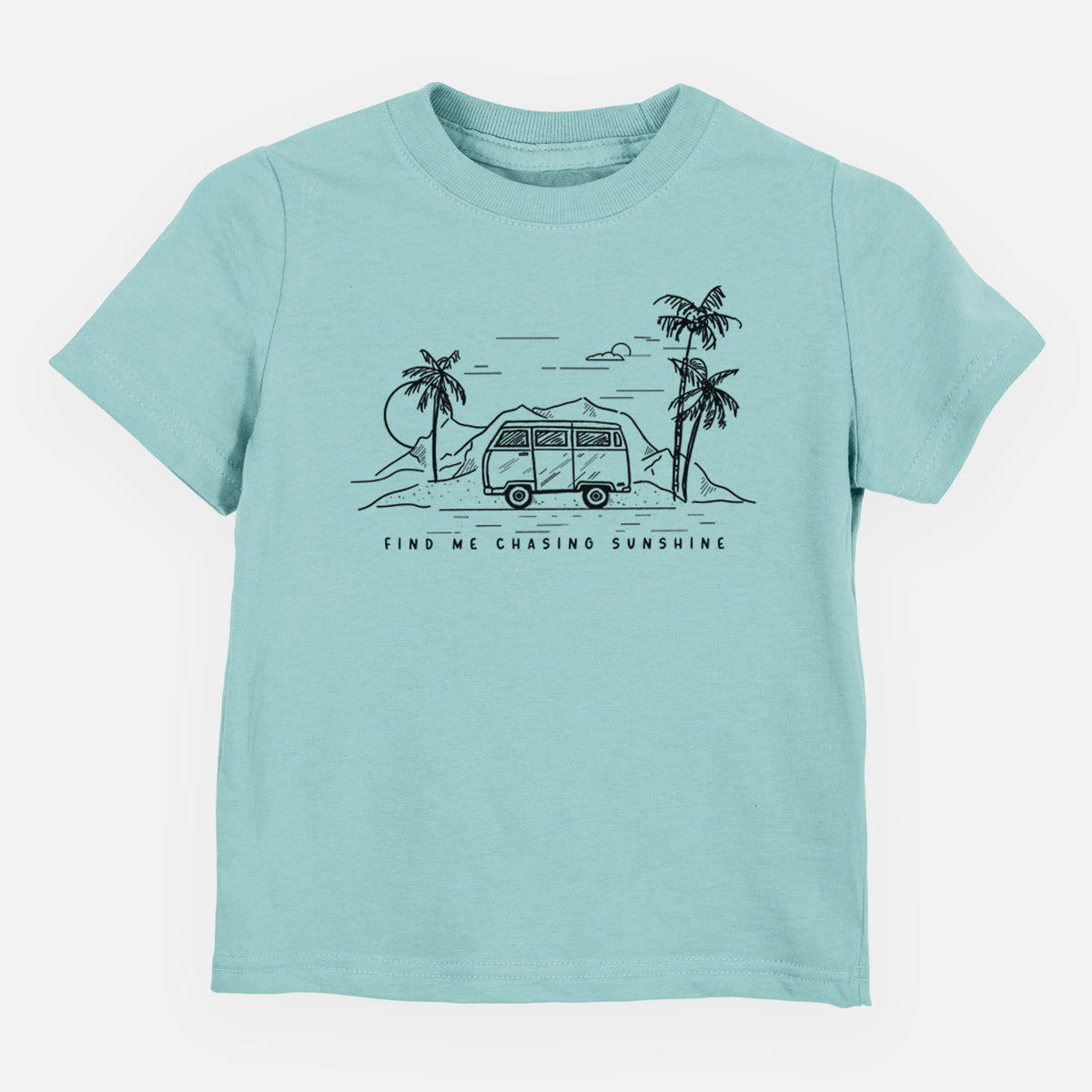 Saltwater toddler t-shirt laid flat, printed with a black ink illustration of a camper van under palm trees and the sun, with the words Find Me Chasing Sunshine.