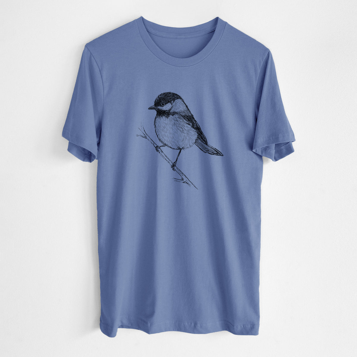 Blue bell lightweight cotton t-shirt laid flat, printed with a detailed black ink sketch of a black-capped chickadee perched on a branch.