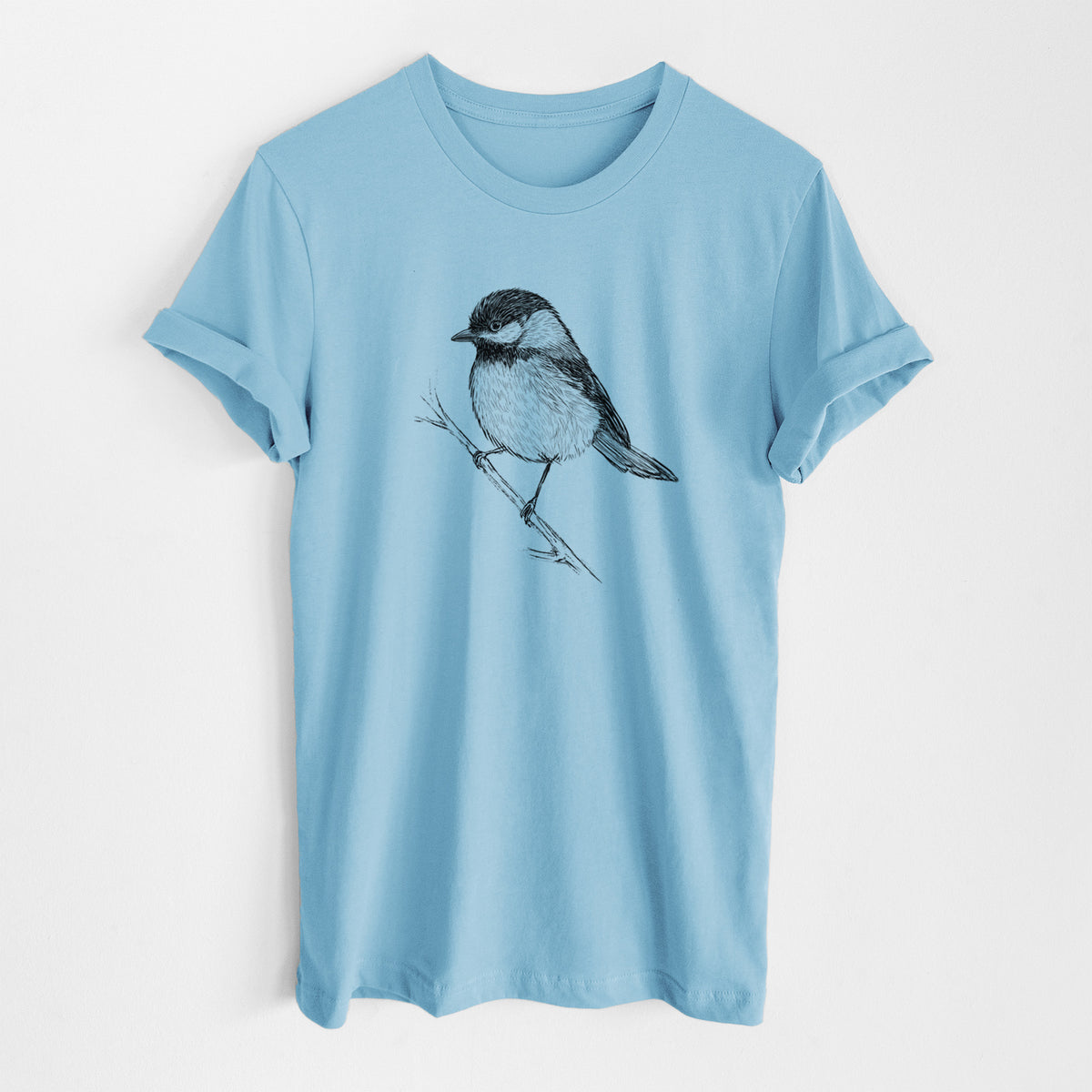 Ocean blue lightweight cotton t-shirt laid flat, printed with a detailed black ink sketch of a black-capped chickadee perched on a branch.