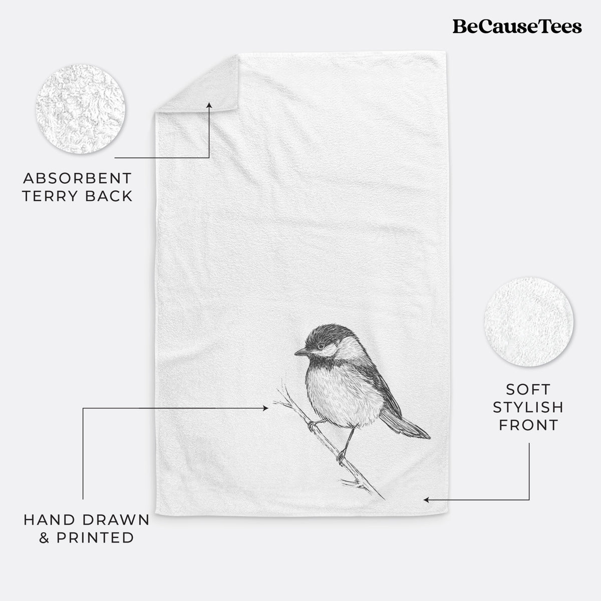White hand towel printed with a detailed black ink sketch of a black-capped chickadee perched on a branch.
