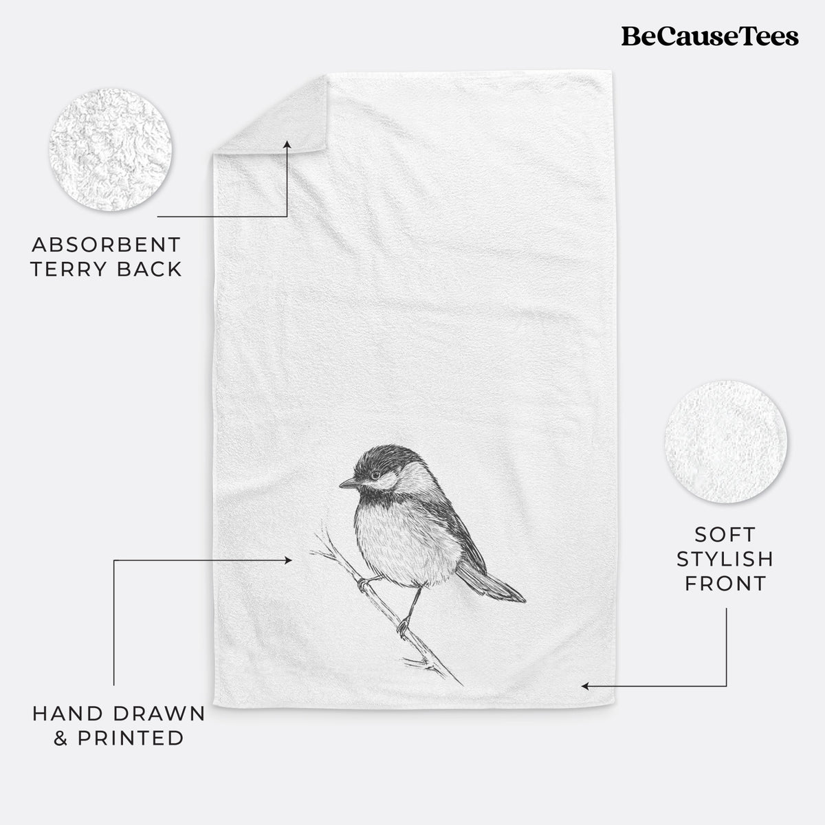 White hand towel printed with a detailed black ink sketch of a black-capped chickadee perched on a branch.