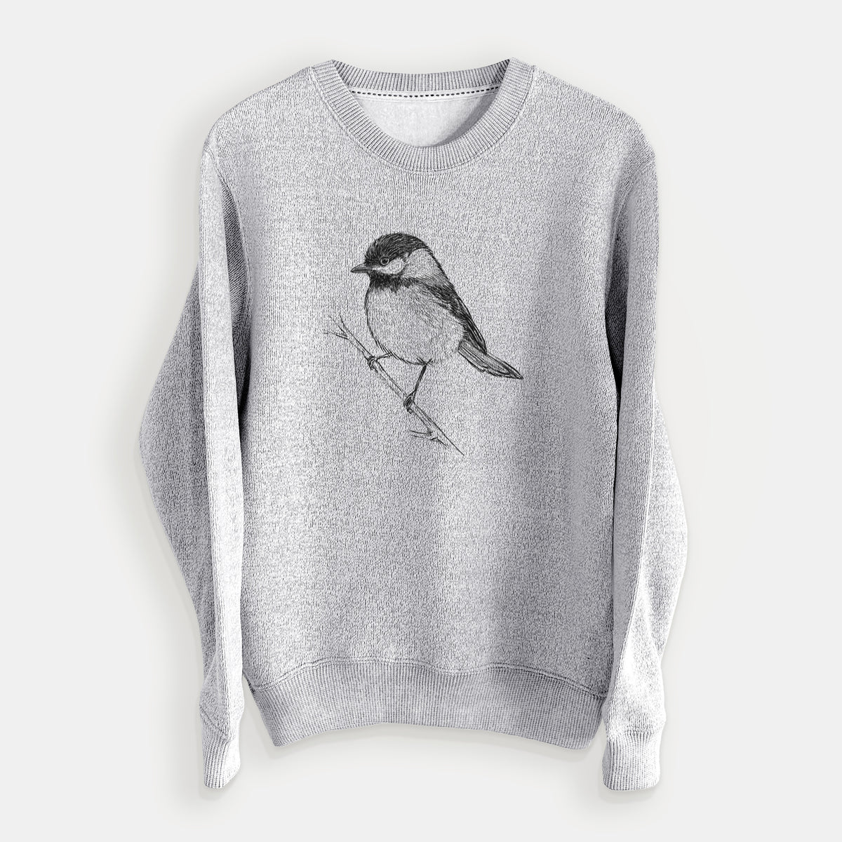 Salt and pepper knit sweatshirt laid flat, printed with a detailed black ink sketch of a black-capped chickadee perched on a branch.