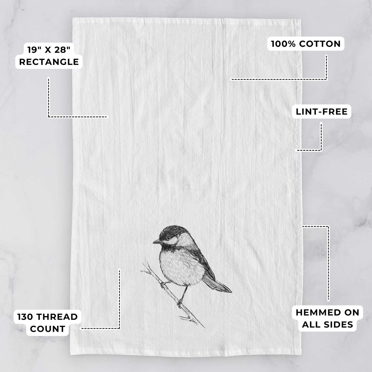 White tea towel printed with a detailed black ink sketch of a black-capped chickadee perched on a branch, with feature labels: 19 by 28 inch rectangle, 100% cotton, lint-free, 130 thread count, hemmed on all sides.