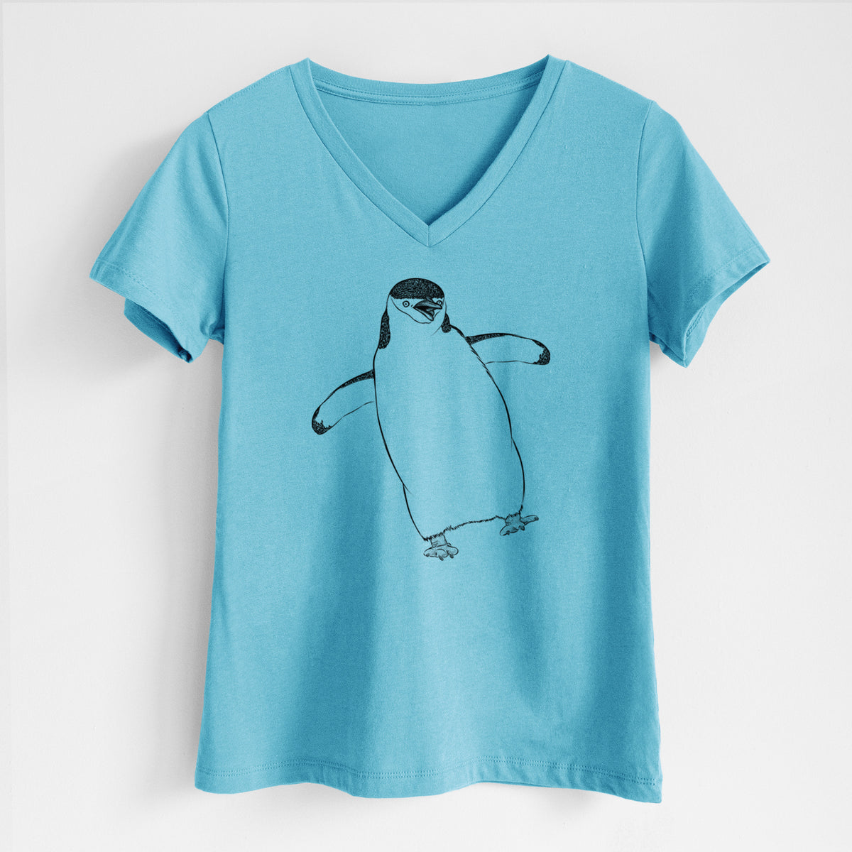 Turquoise women's relaxed fit cotton V-neck t-shirt laid flat, printed with a black ink illustration of a chinstrap penguin standing with its flippers out.