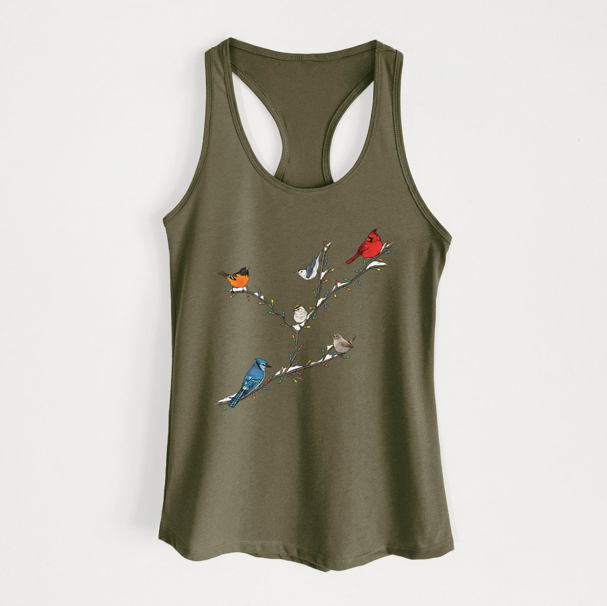 Military green women's racerback tank top laid flat, printed with a full-color illustration of winter backyard birds, including a cardinal, blue jay and robin, perched on bare branches.