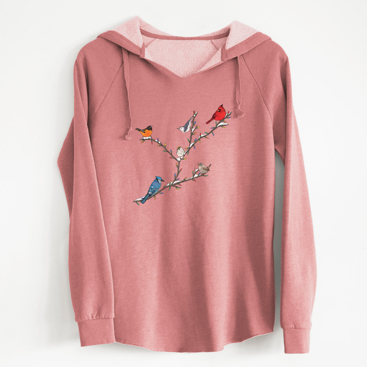 Dusty rose women's Cali Wave hooded sweatshirt laid flat, printed with a full-color illustration of winter backyard birds, including a cardinal, blue jay and robin, perched on bare branches.