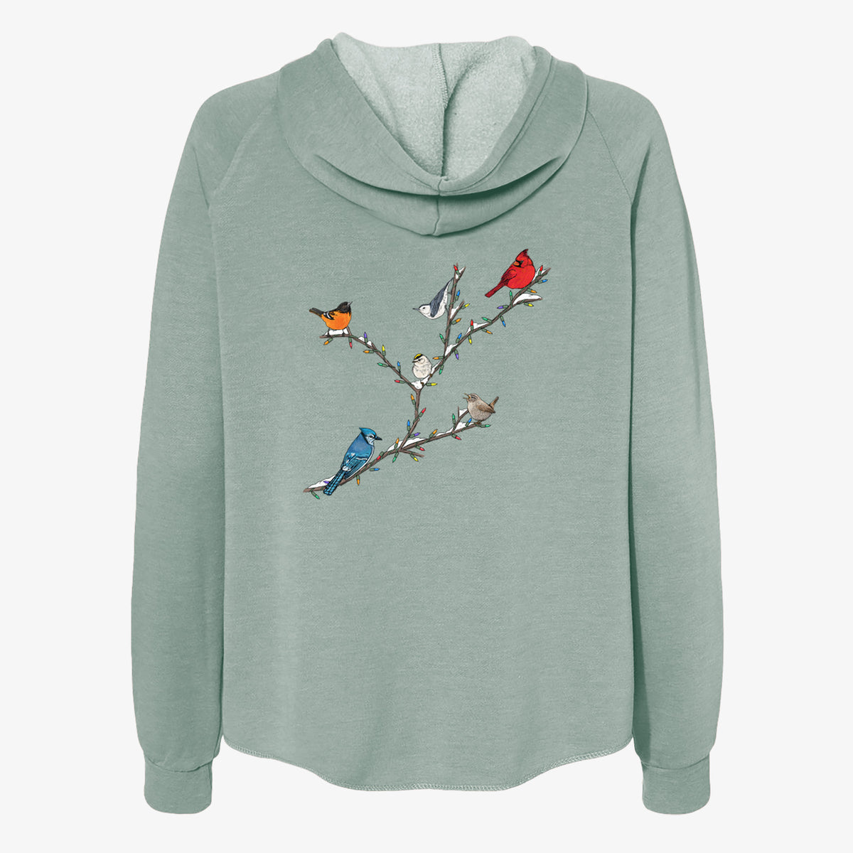 Sage green women's Cali Wave zip-up sweatshirt laid flat, printed with a full-color illustration of winter backyard birds, including a cardinal, blue jay and robin, perched on bare branches.