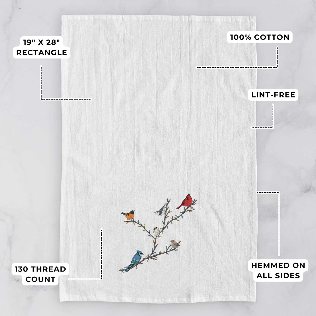 White tea towel printed with a full-color illustration of winter backyard birds, including a cardinal, blue jay and robin, perched on bare branches, with feature labels: 19 by 28 inch rectangle, 100% cotton, lint-free, 130 thread count, hemmed on all sides.