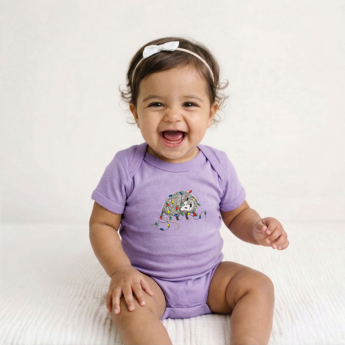Christmas Opossum - Baby Fine Jersey Bodysuit in Lavender, worn by model