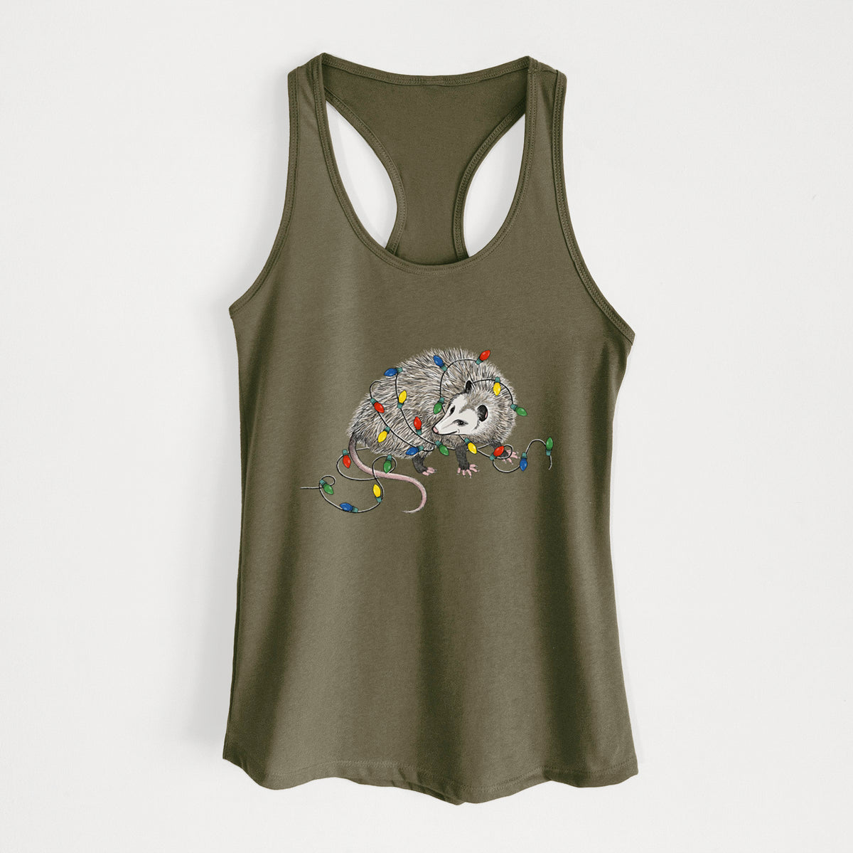 Military green women's racerback tank top laid flat, printed with a black ink opossum tangled in a string of colorful holiday lights.