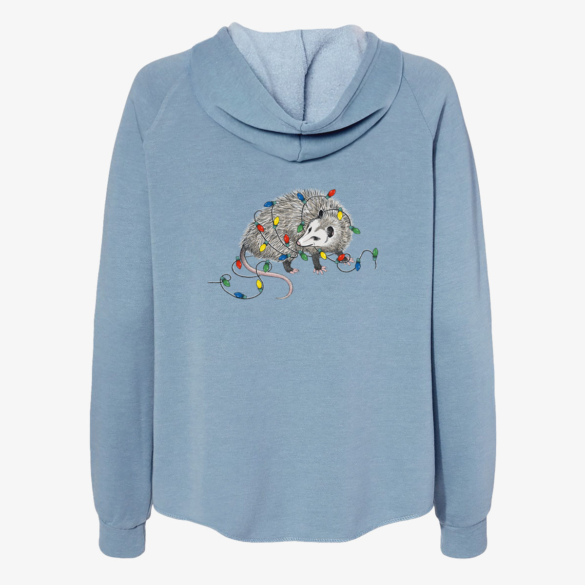 Misty blue women's Cali Wave zip-up sweatshirt laid flat, printed with a black ink opossum tangled in a string of colorful holiday lights.