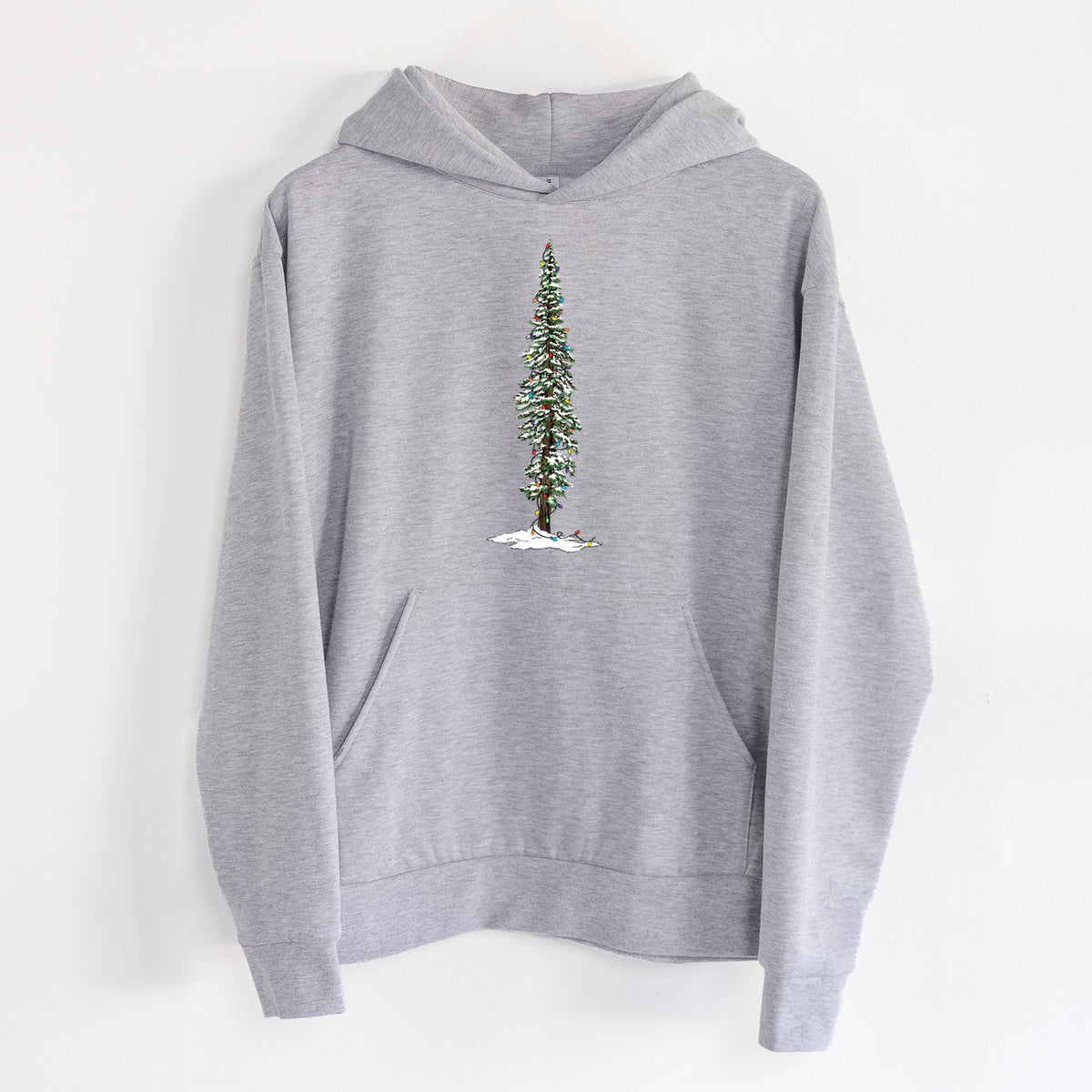 Christmas Redwood Tree - Statement Midweight Hoodie in Heather Grey, hanging on a white wall, with a front kangaroo pocket and no drawcords.