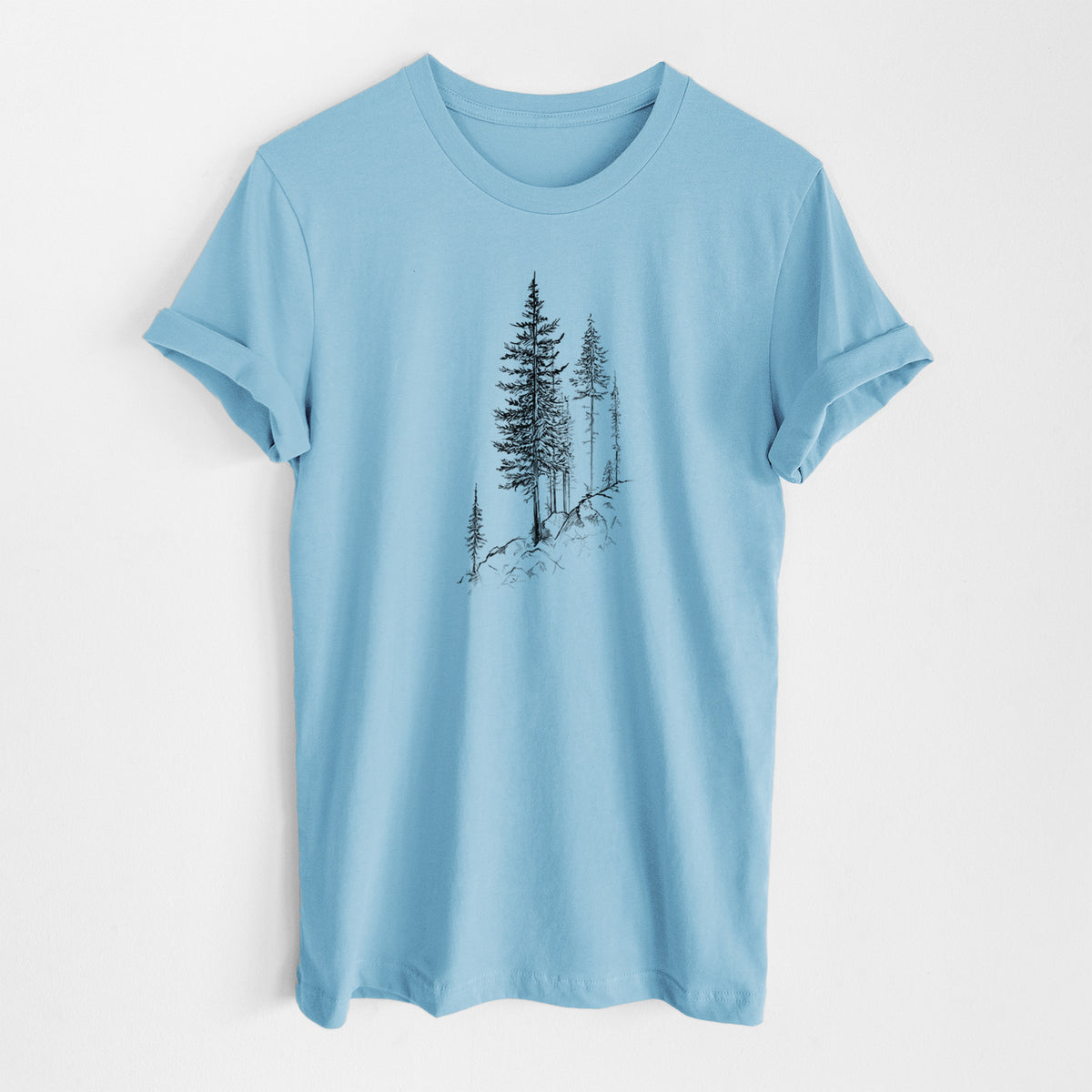 Ocean blue lightweight cotton t-shirt laid flat, printed with a black ink illustration of tall pine trees growing from a rocky cliff.