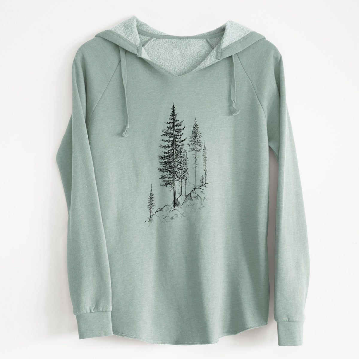 Sage green women's Cali Wave hooded sweatshirt laid flat, printed with a black ink illustration of tall pine trees growing from a rocky cliff.