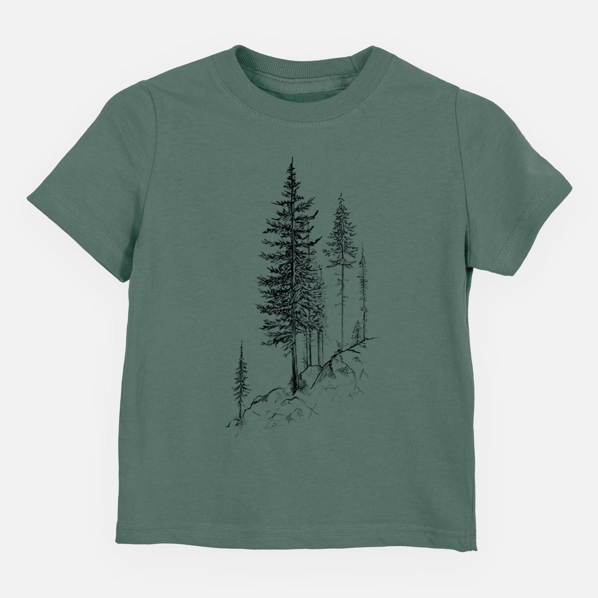 Basil green toddler t-shirt laid flat, printed with a black ink illustration of tall pine trees growing from a rocky cliff.