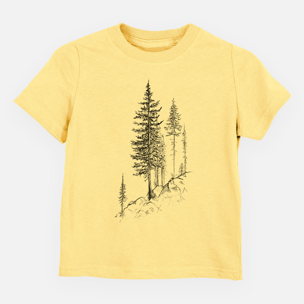 Butter yellow toddler t-shirt laid flat, printed with a black ink illustration of tall pine trees growing from a rocky cliff.
