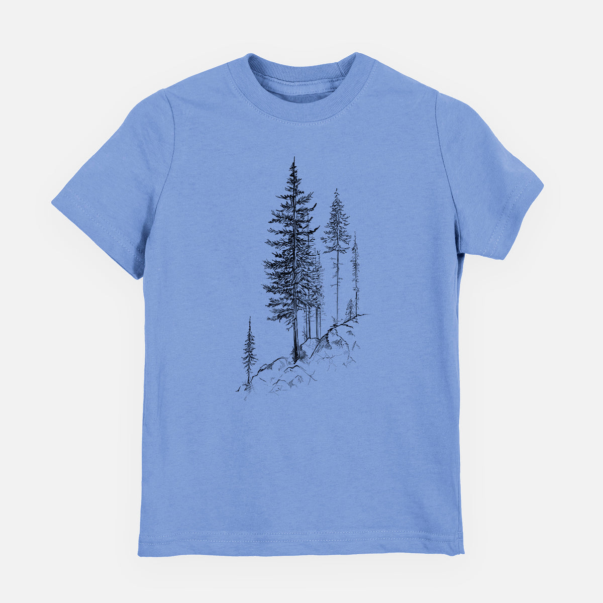Carolina blue youth t-shirt laid flat, printed with a black ink illustration of tall pine trees growing from a rocky cliff.