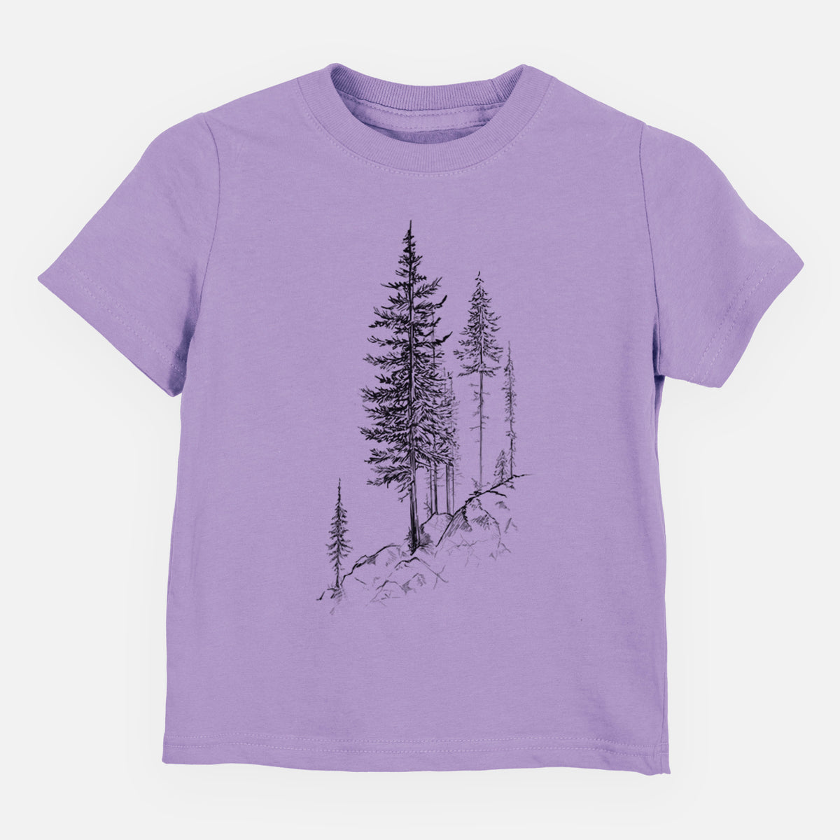 Lavender toddler t-shirt laid flat, printed with a black ink illustration of tall pine trees growing from a rocky cliff.