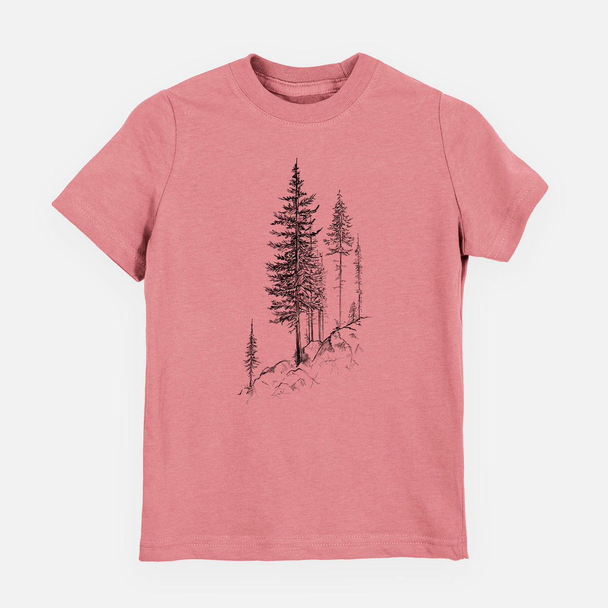 Mauve pink youth t-shirt laid flat, printed with a black ink illustration of tall pine trees growing from a rocky cliff.