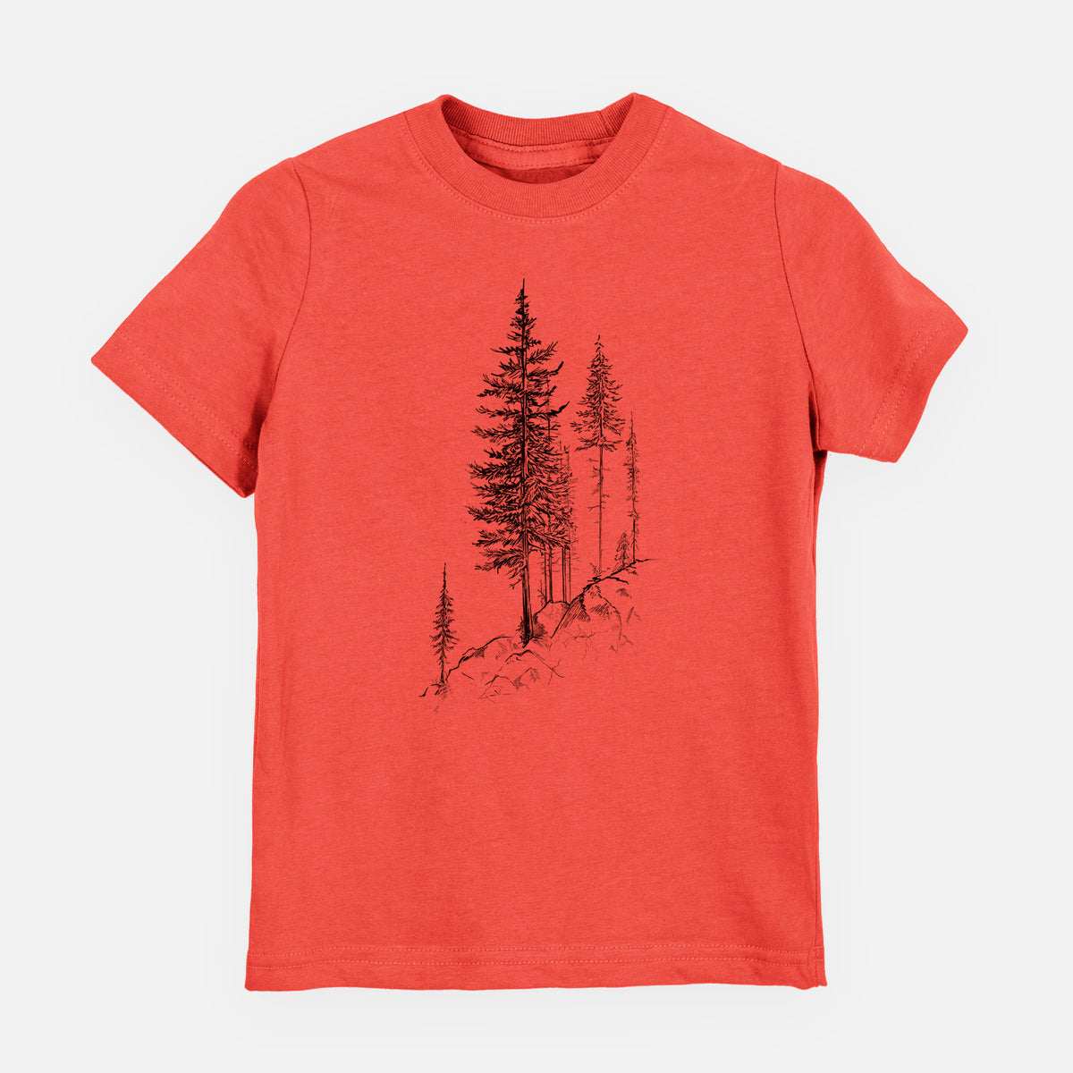 Passionfruit pink youth t-shirt laid flat, printed with a black ink illustration of tall pine trees growing from a rocky cliff.