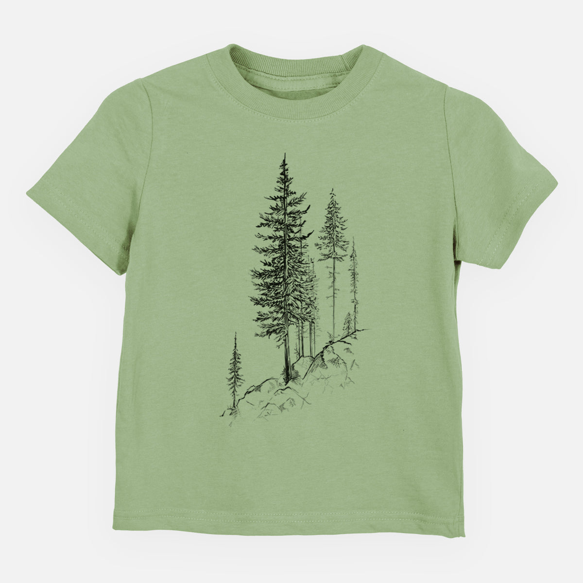 Sage green toddler t-shirt laid flat, printed with a black ink illustration of tall pine trees growing from a rocky cliff.