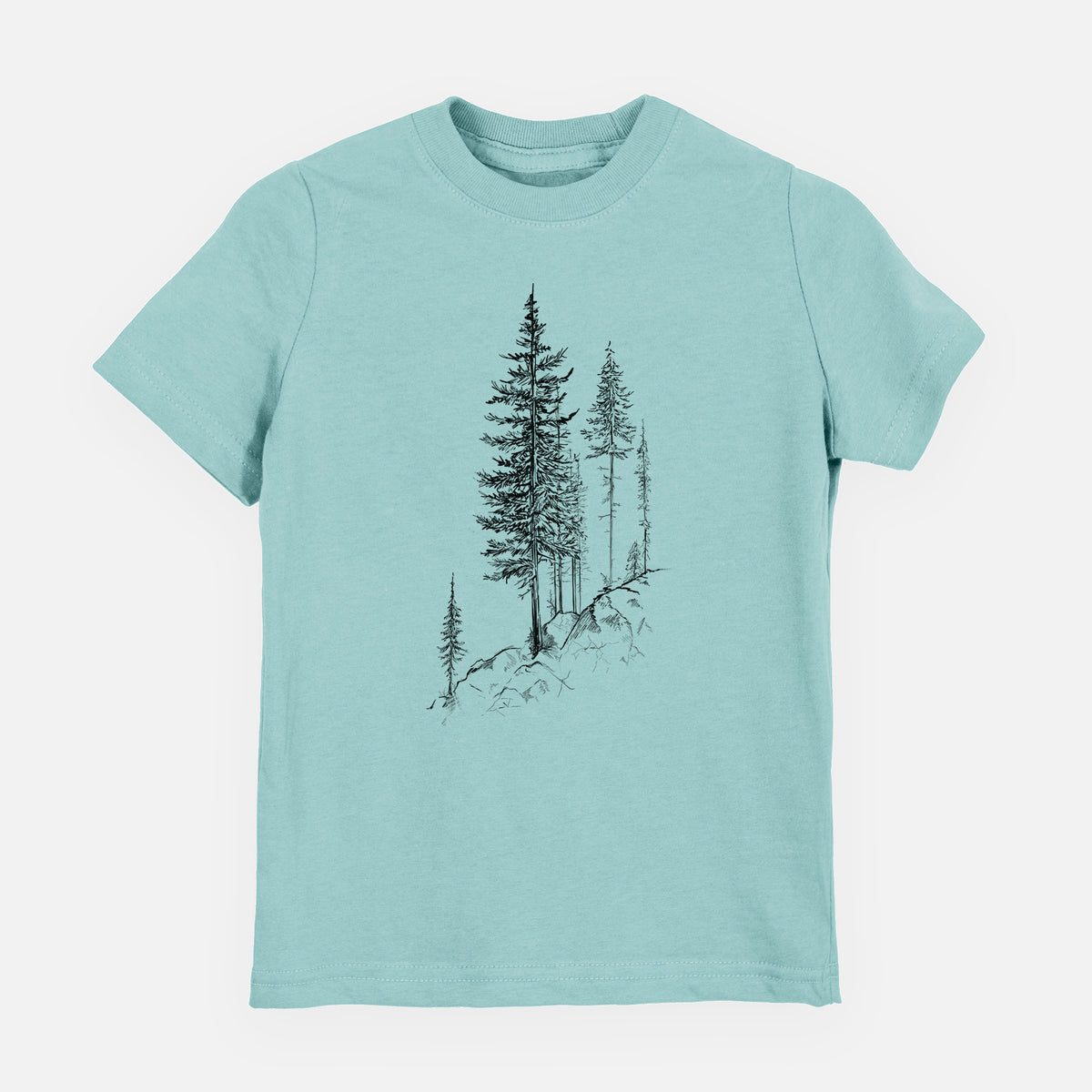 Saltwater youth t-shirt laid flat, printed with a black ink illustration of tall pine trees growing from a rocky cliff.