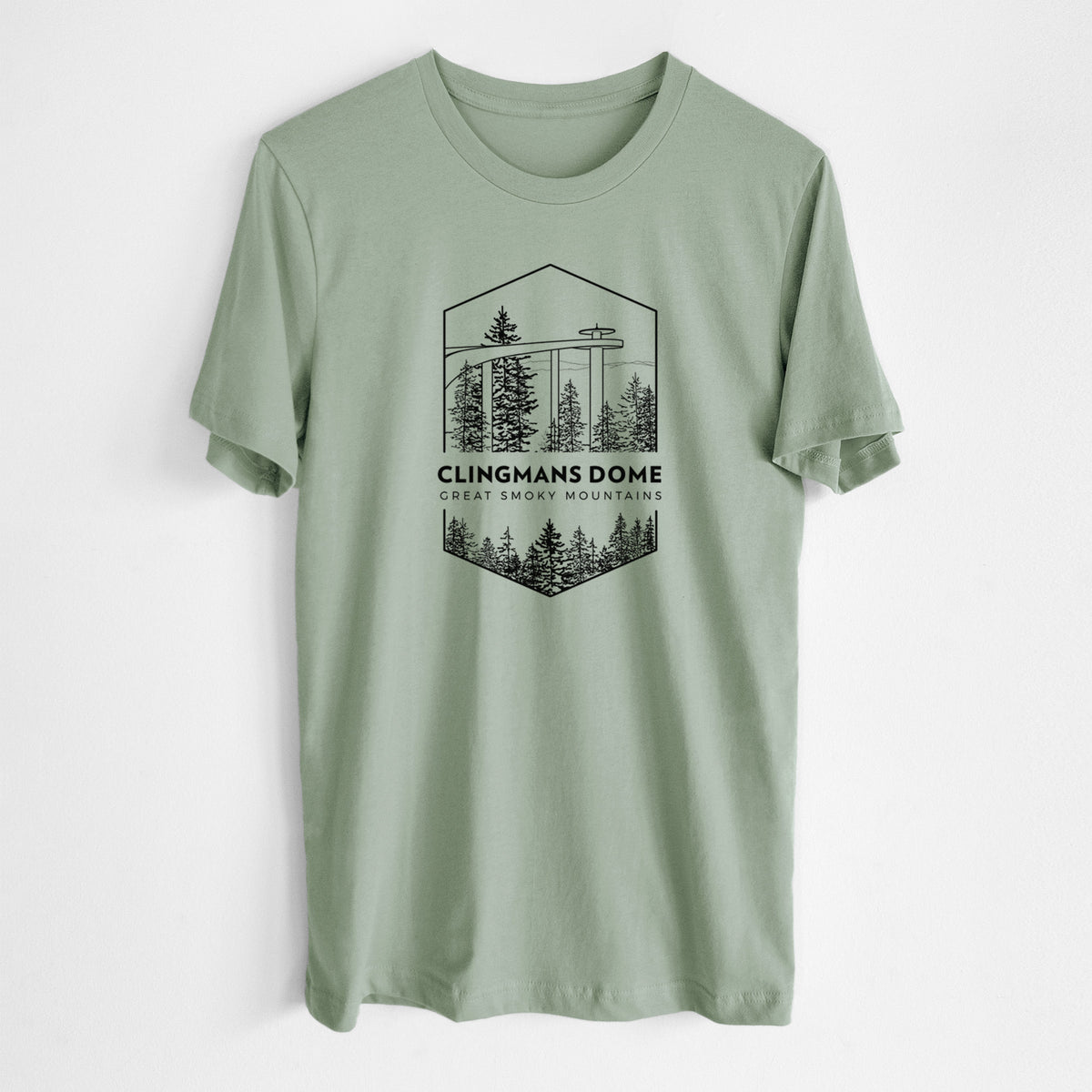 Sage green lightweight cotton t-shirt laid flat, printed with a black line art badge of the Clingmans Dome observation tower above a pine forest, with the words Clingmans Dome, Great Smoky Mountains.