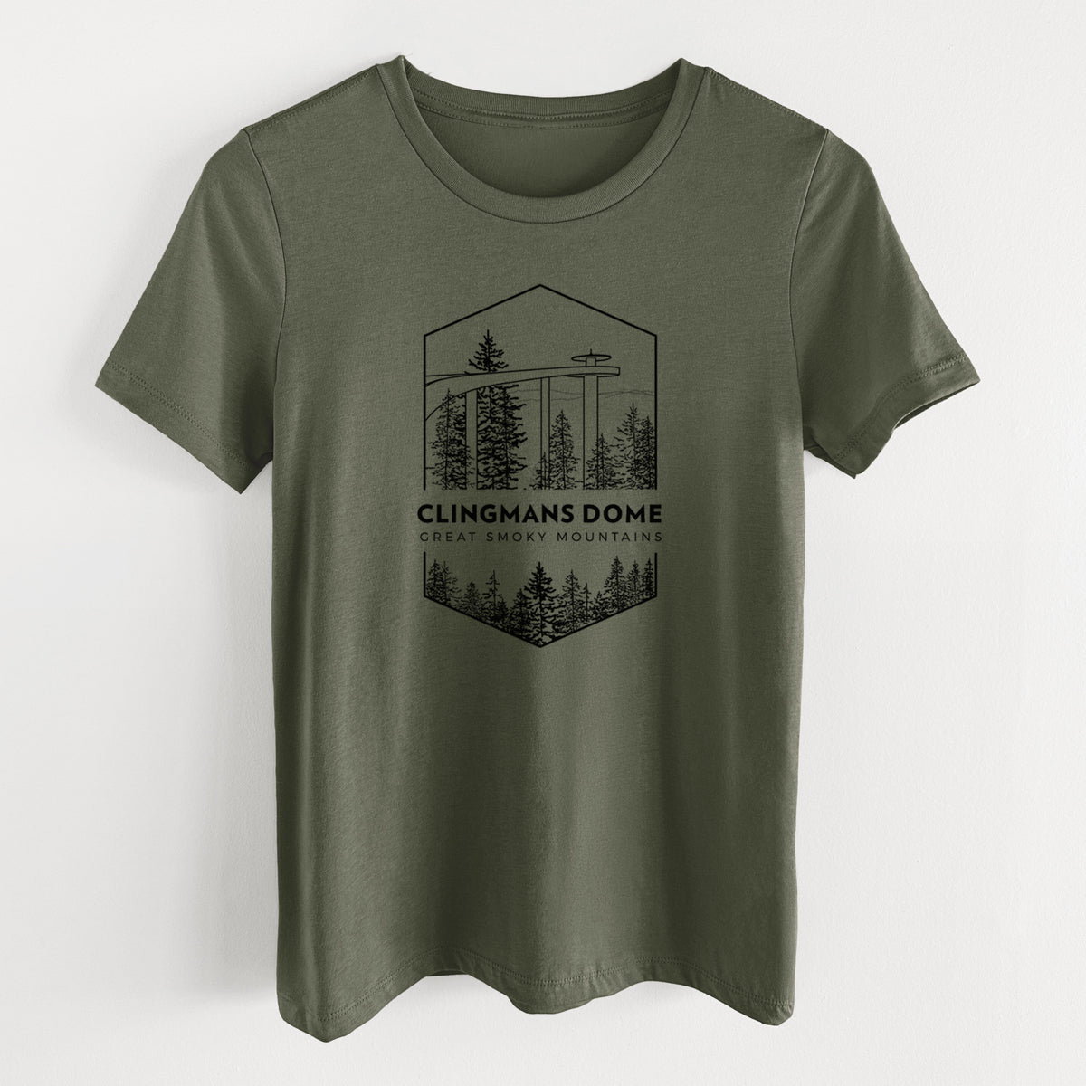 Military green women's relaxed fit cotton t-shirt laid flat, printed with a black line art badge of the Clingmans Dome observation tower above a pine forest, with the words Clingmans Dome, Great Smoky Mountains.