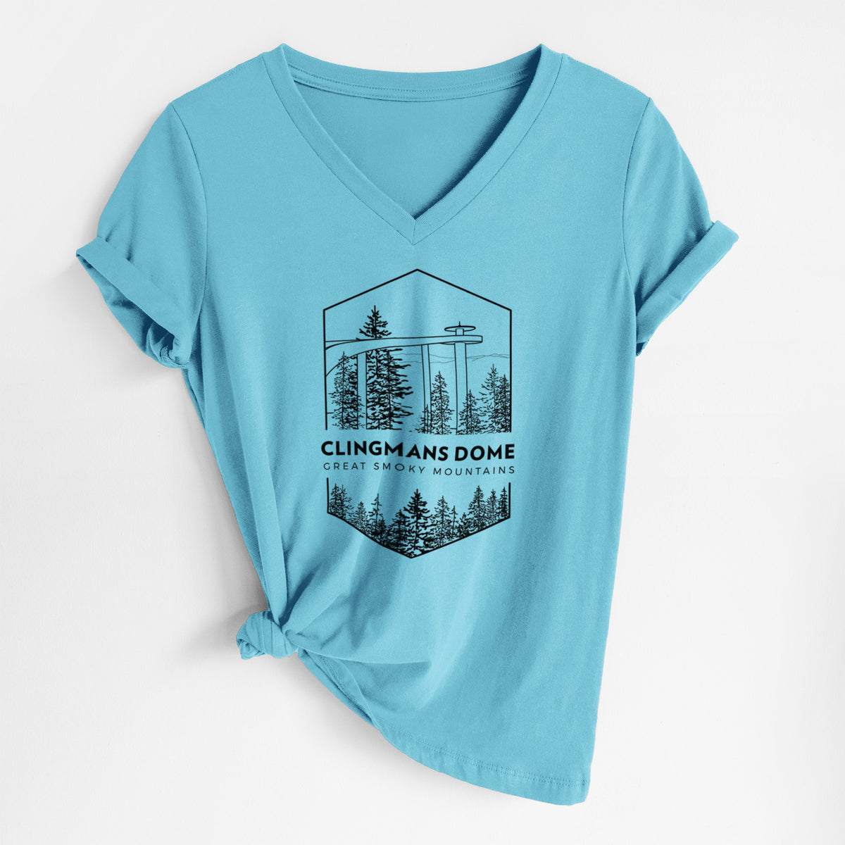 Turquoise women's relaxed fit cotton V-neck t-shirt laid flat, printed with a black line art badge of the Clingmans Dome observation tower above a pine forest, with the words Clingmans Dome, Great Smoky Mountains.