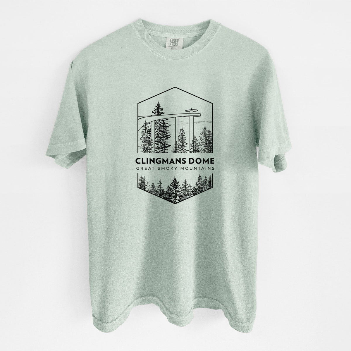 Bay green Comfort Colors t-shirt laid flat, printed with a black line art badge of the Clingmans Dome observation tower above a pine forest, with the words Clingmans Dome, Great Smoky Mountains.
