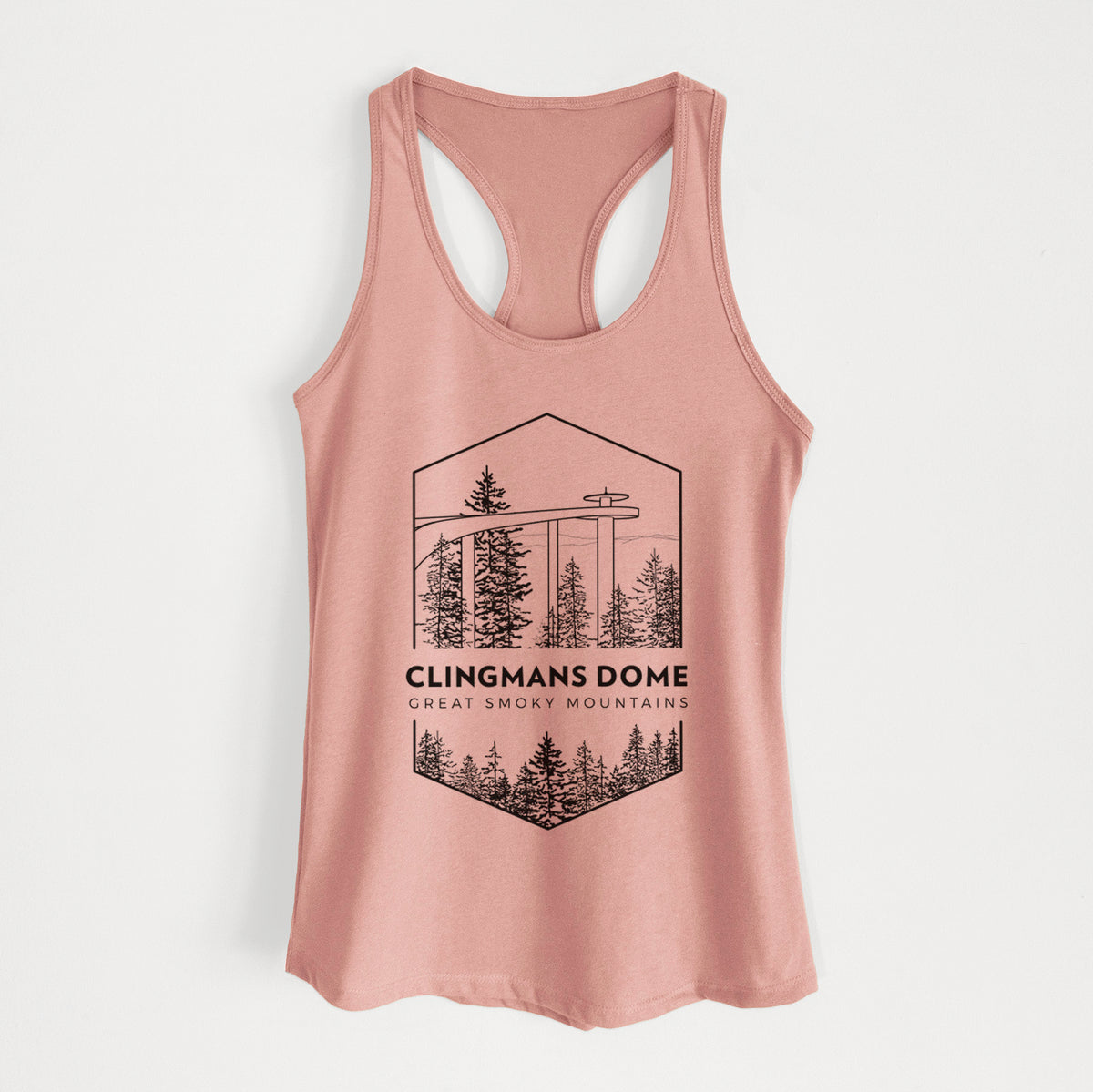Desert pink women's racerback tank top laid flat, printed with a black line art badge of the Clingmans Dome observation tower above a pine forest, with the words Clingmans Dome, Great Smoky Mountains.