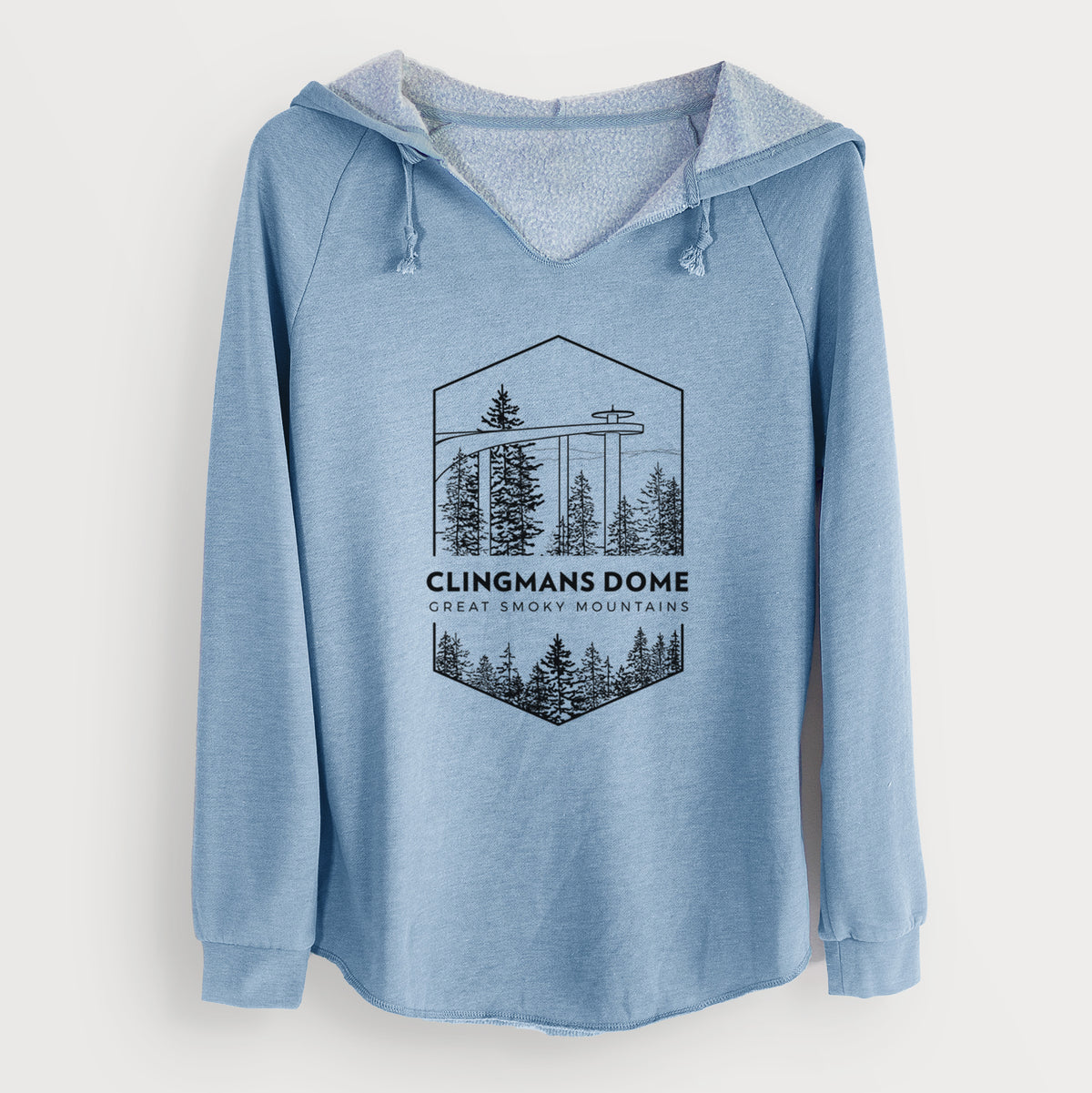 Misty blue women's Cali Wave hooded sweatshirt laid flat, printed with a black line art badge of the Clingmans Dome observation tower above a pine forest, with the words Clingmans Dome, Great Smoky Mountains.