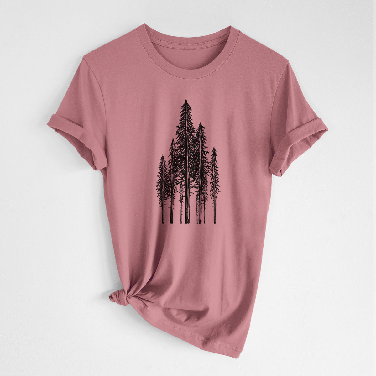 Mauve pink lightweight cotton t-shirt laid flat with the sleeves rolled, printed with a black ink illustration of a stand of tall coastal redwood trees with slender trunks and layered branches.