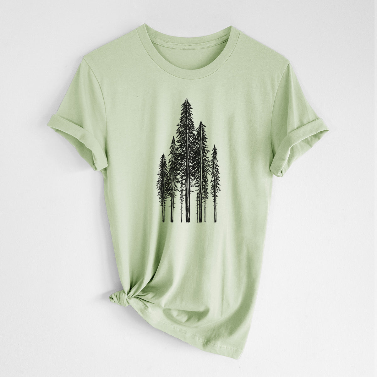 Spring green lightweight cotton t-shirt laid flat with the sleeves rolled, printed with a black ink illustration of a stand of tall coastal redwood trees with slender trunks and layered branches.