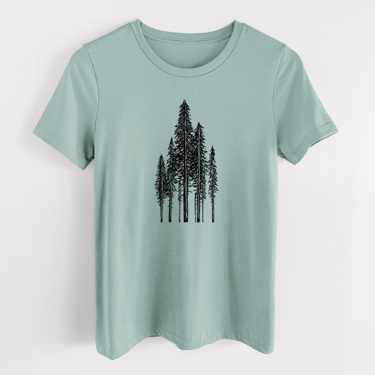 Dusty blue women's relaxed fit cotton t-shirt laid flat, printed with a black ink illustration of a stand of tall coastal redwood trees with slender trunks and layered branches.