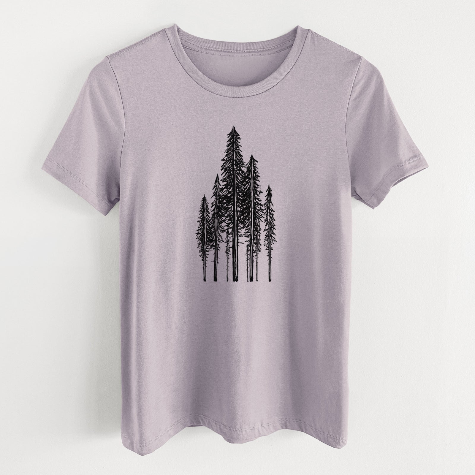Light violet women's relaxed fit cotton t-shirt laid flat, printed with a black ink illustration of a stand of tall coastal redwood trees with slender trunks and layered branches.