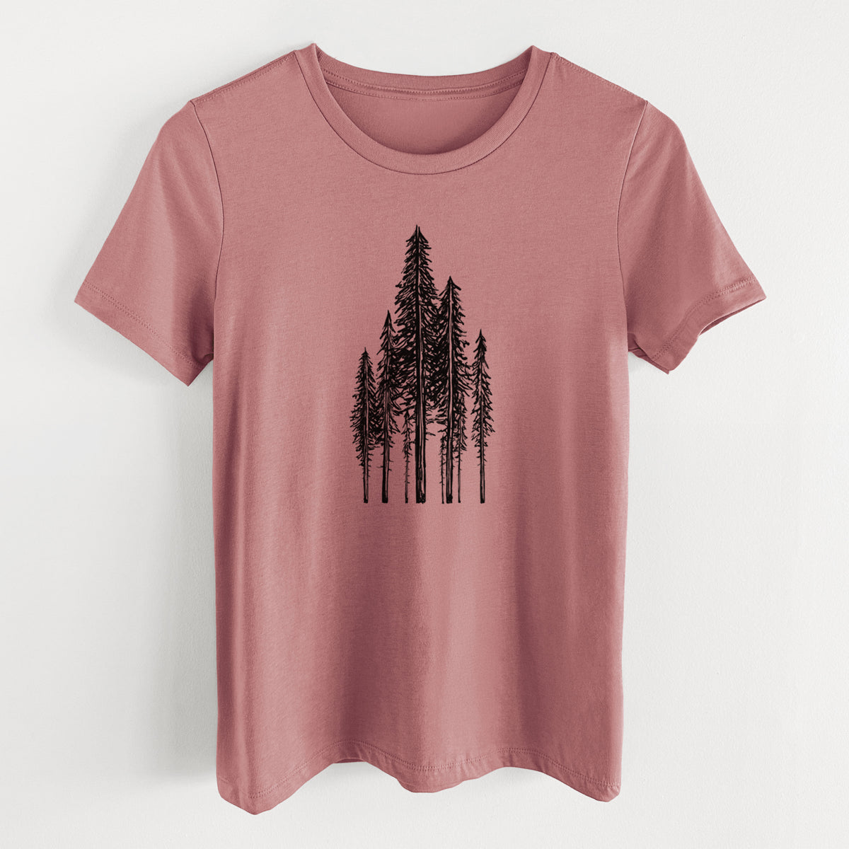 Mauve pink women's relaxed fit cotton t-shirt laid flat, printed with a black ink illustration of a stand of tall coastal redwood trees with slender trunks and layered branches.