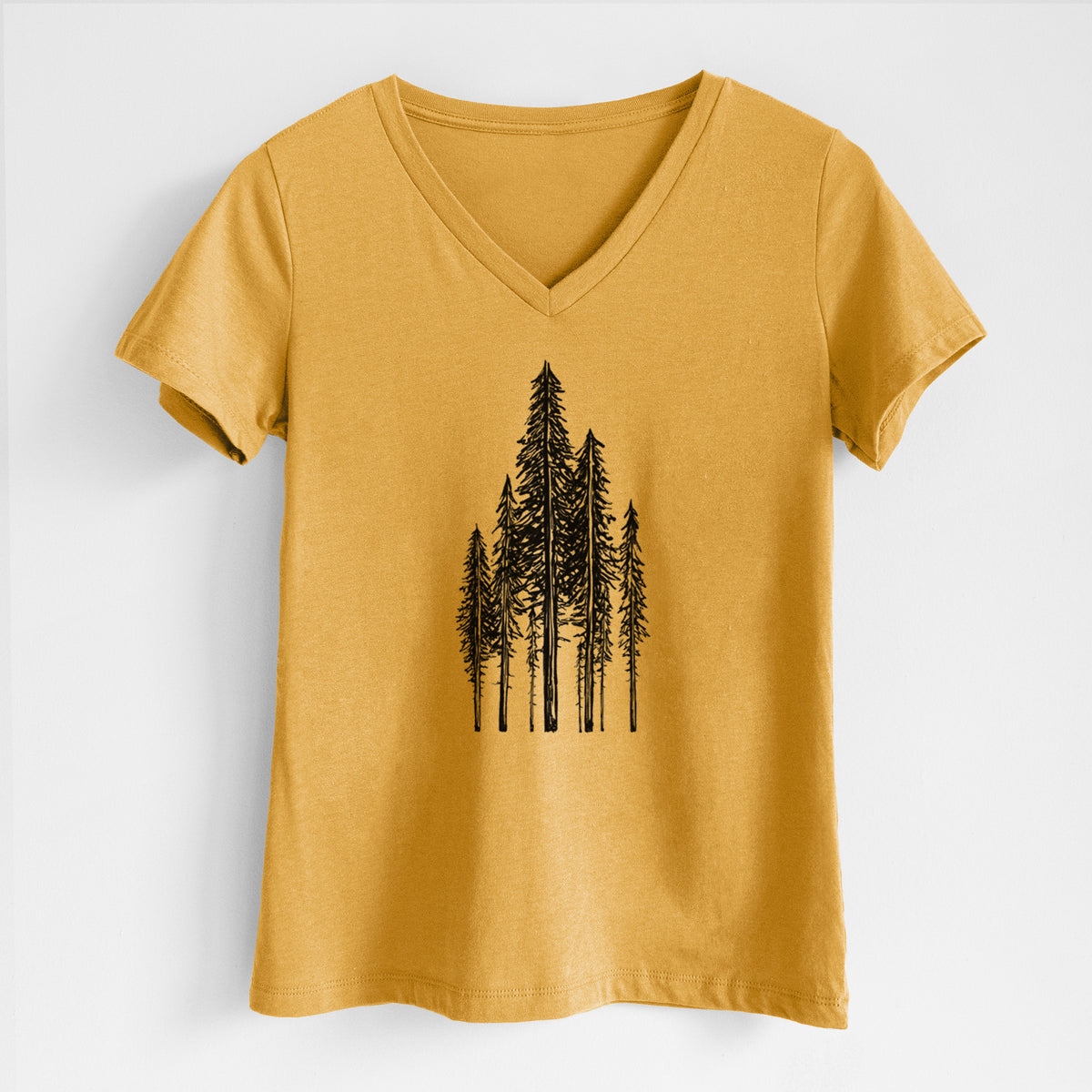 Honeycomb yellow women's relaxed fit cotton V-neck t-shirt laid flat, printed with a black ink illustration of a stand of tall coastal redwood trees with slender trunks and layered branches.