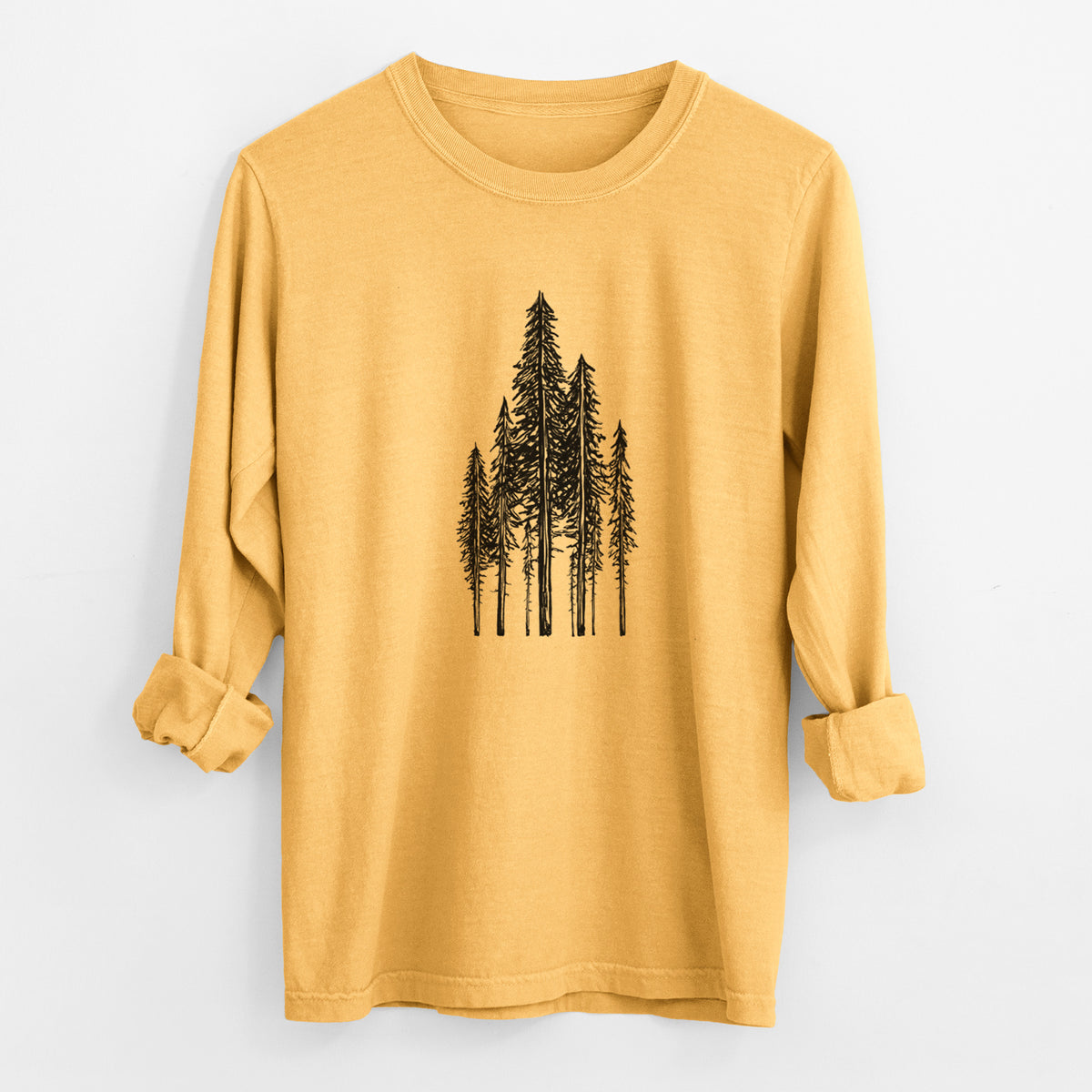 Golden wheat yellow Comfort Colors long sleeve shirt laid flat with the cuffs rolled, printed with a black ink illustration of a stand of tall coastal redwood trees with slender trunks and layered branches.