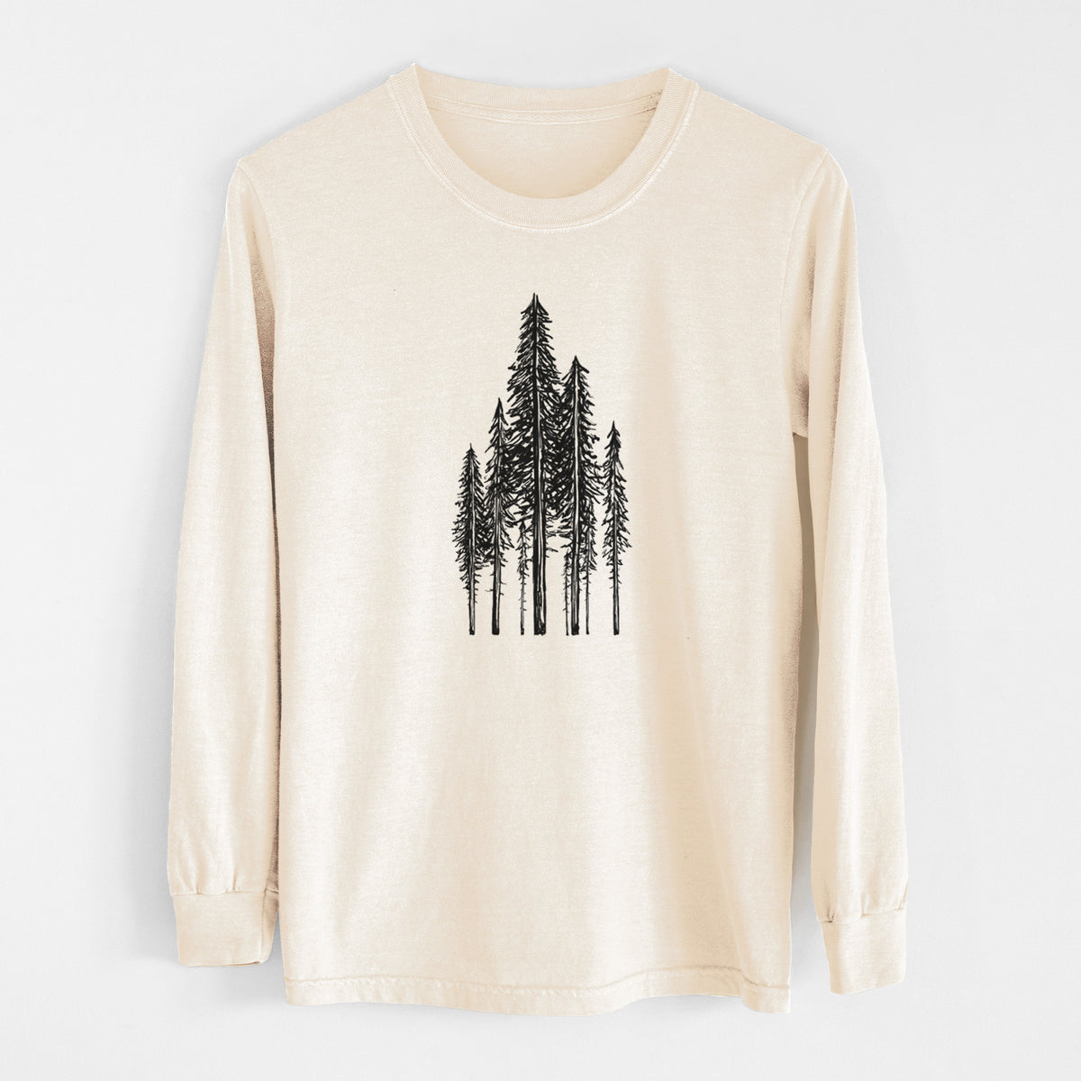 Ivory Comfort Colors long sleeve shirt laid flat, printed with a black ink illustration of a stand of tall coastal redwood trees with slender trunks and layered branches.