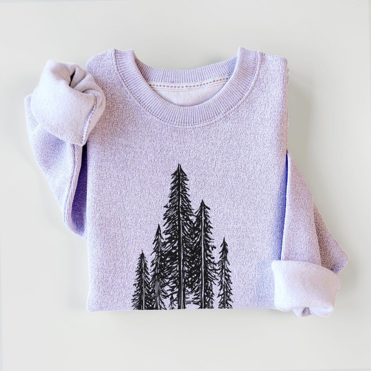 Ice purple knit sweatshirt printed with a black ink illustration of a stand of tall coastal redwood trees with slender trunks and layered branches, styled flat.